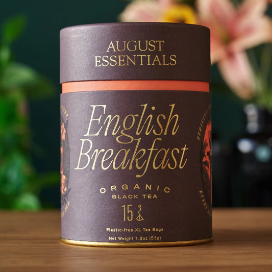 Essentials English Breakfast Black Tea in a decorative tin featuring organic English breakfast black tea. 15 tea bags included.