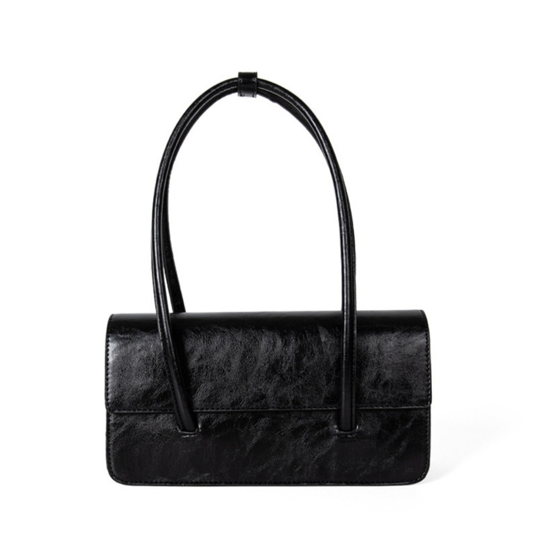 Stylish oil wax leather shoulder tote bag with elegant top handle design, perfect for women.