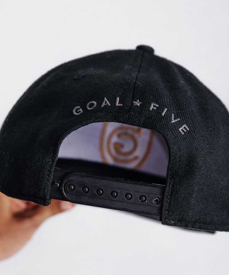 Back view of the G5 Flat Billed Snap Back Hat displaying the 'GOAL FIVE' logo.