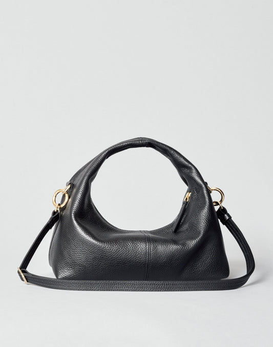Mini everyday shoulder bag in black leather with slouchy silhouette and gold hardware.