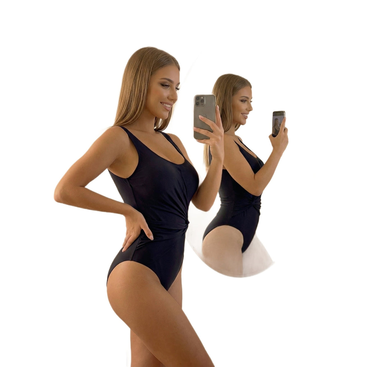 Model showcasing a one piece bathing suit tummy control in black color, highlighting its elegant design and fit.