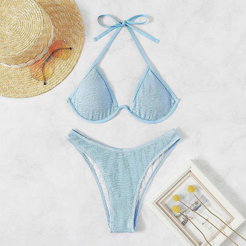 Backless triangle bikini swimsuit in light blue, featuring underwire triangle top and matching bottom, perfect beachwear.