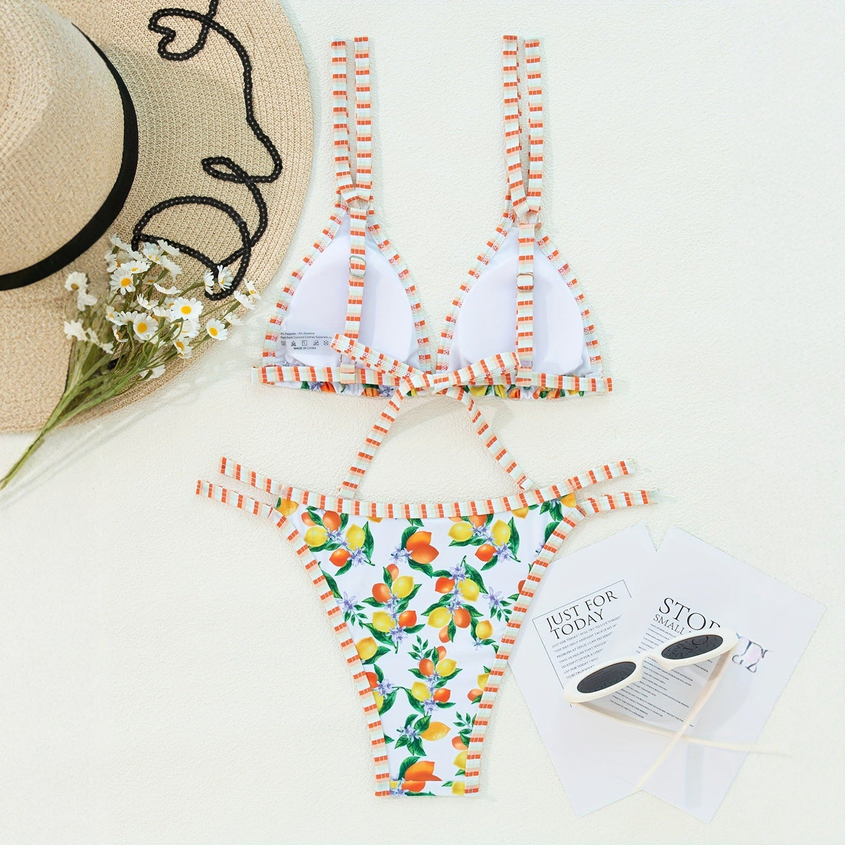 Sexy printed bikini swimsuit set with fruit print, featuring triangle top and matching bottom, perfect for beach wear.