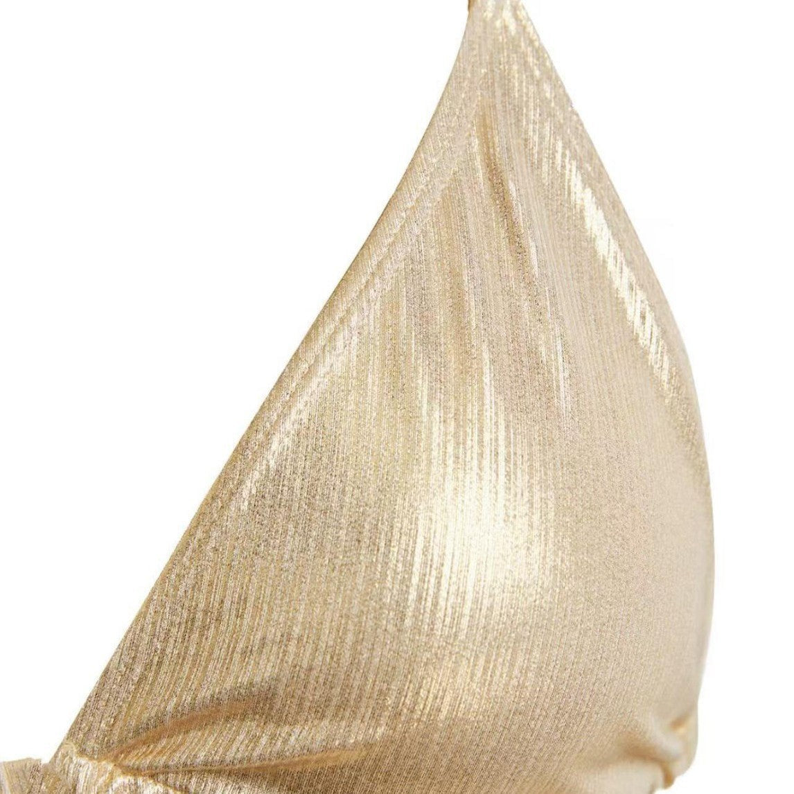 Close-up of women's sexy slimming bikini for small bust with shiny gold fabric design.