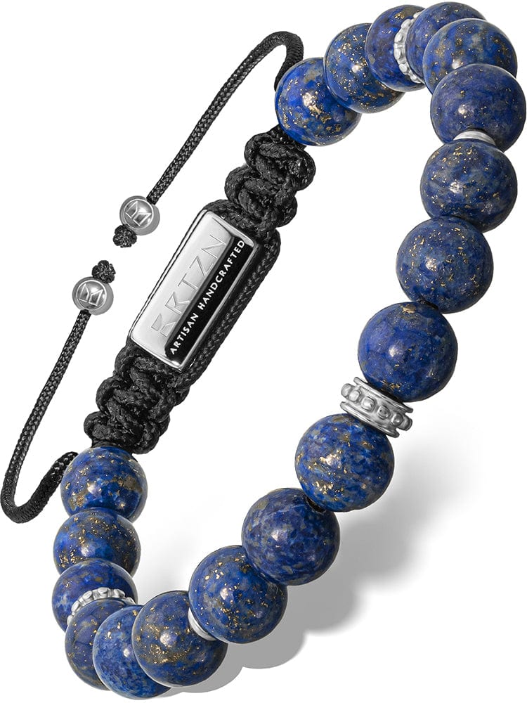 Artisan handcrafted men's lapis lazuli beaded bracelet with deep blue stones, silver metal accents, and adjustable black cord.
