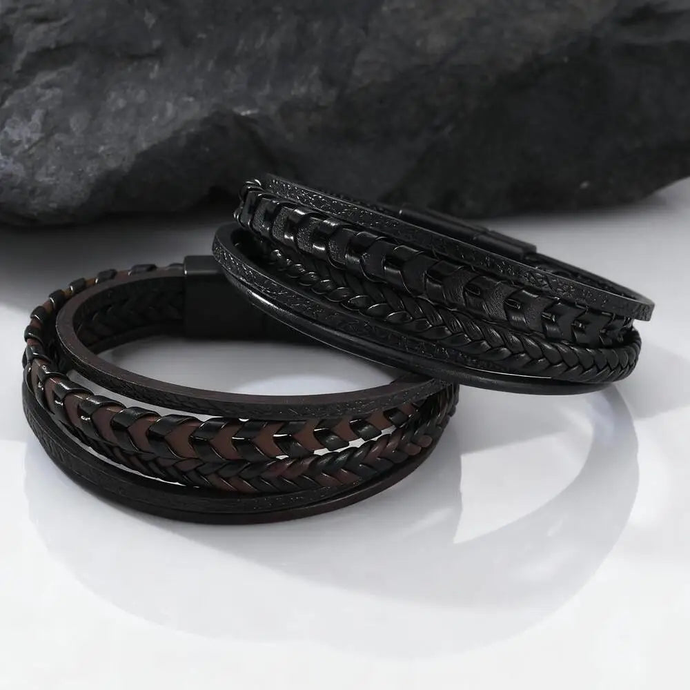 Multi-layer mens braided leather bracelet in black and brown with a magnetic buckle.