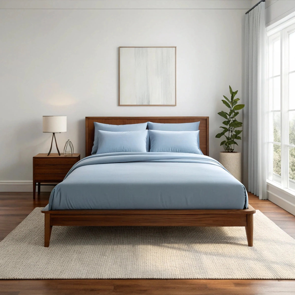 Cozy bedroom setting featuring copper infused bamboo sheets on a stylish wooden bed.
