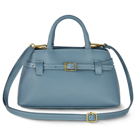 Italian leather top-handle bag in denim color with top handles, adjustable strap, and buckle accent.