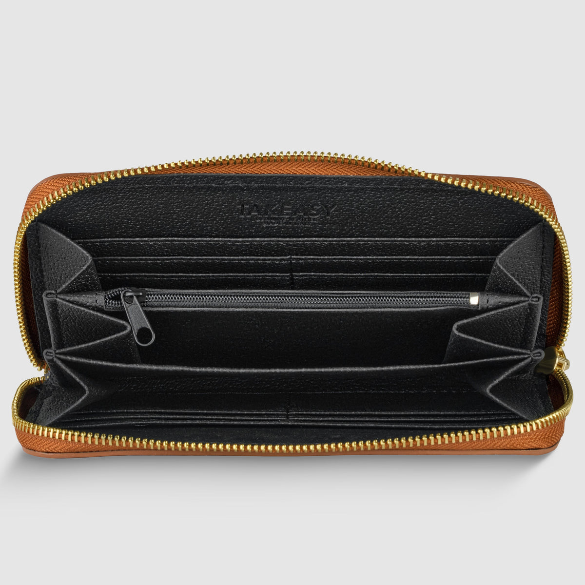 Italian full-grain leather wallet for women interior view showing compartments and card slots.